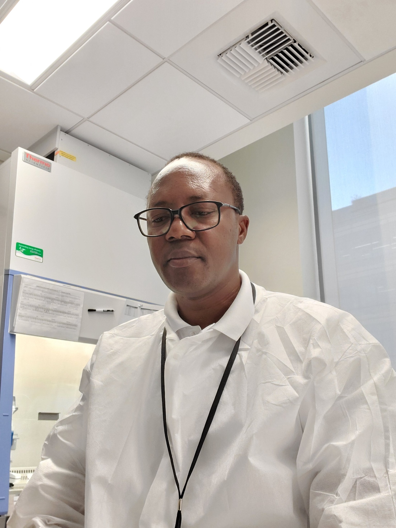 Japheth Mdenyo in a laboratory setting